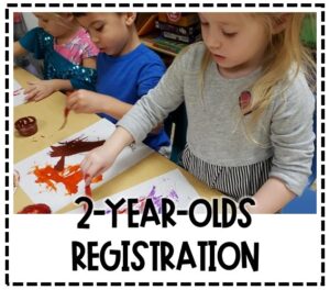 Image of three children at a table painting with feathers. Text Reads 2-Year-Olds Registration