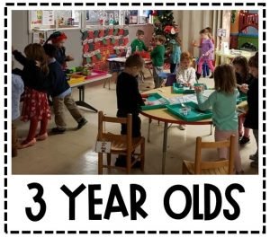 Image shows many students playing and learning in a classroom decorated for Christmas. Text reads 3 Year Olds