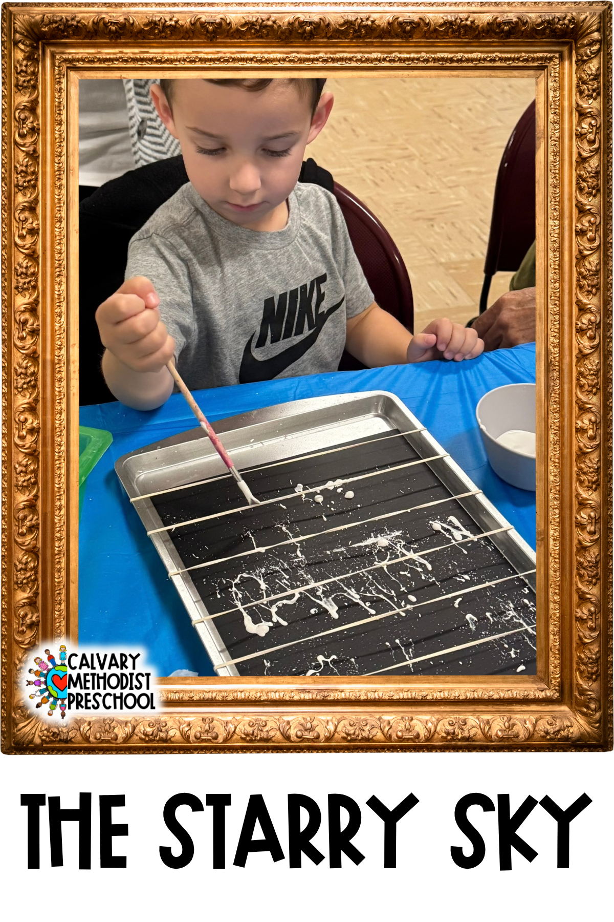Image of a young boy creating a starry night background using a baking tray, rubber bands, and white paint.